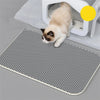 cat litter trapping mat beside litter box