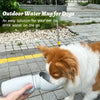 dog drinking from portable water bottle